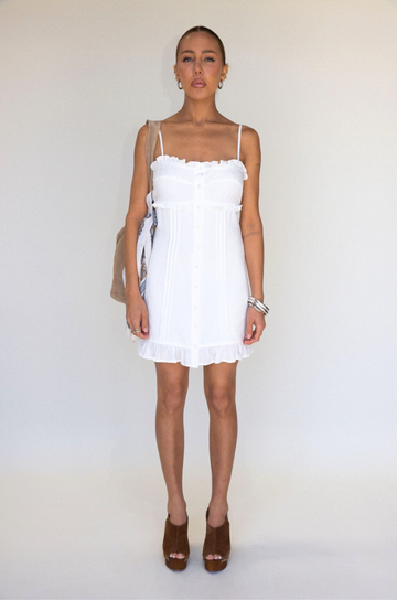 white Woven cami mini dress
Button down closure
Adjustable straps
Ruffled trim
Lined
bridal dress outfit
bachelorette 
white mini dress
summer dress
spring dress