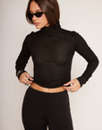 black Thin knit top
Turtleneck
Long sleeves
Unlined
black sheer long sleeve top