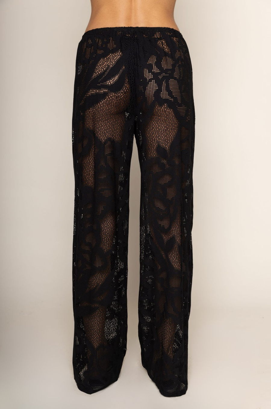 black Open knit lace cover up pants
Elastic waistband
Unlined/sheer