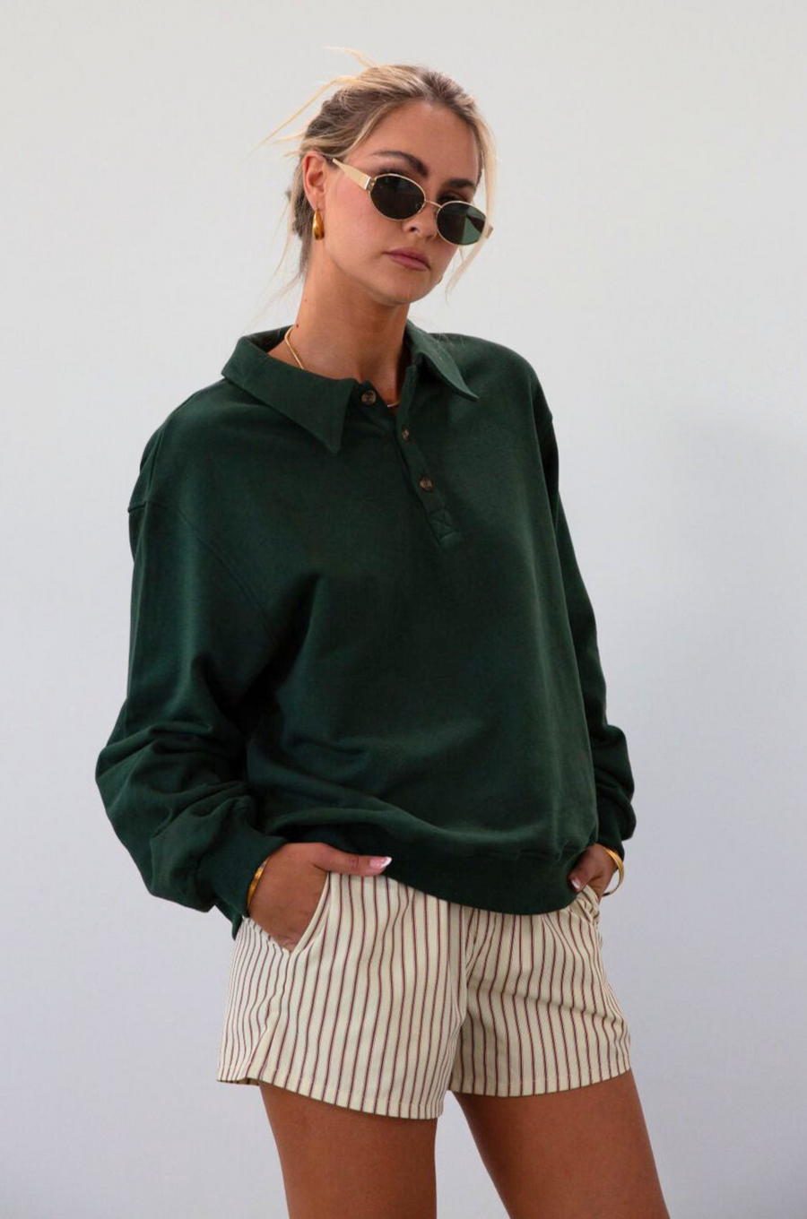 Knit top. Collar neckline. Front button down closure. Unlined. green sweatshirt. fall outfit. fall top. fall transition. cute casual outfit.