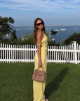 yellow Striped off the shoulder top
Asymmetrical hem
Twisted strap
Side zipper
Unlined
hamptons east coast outfit