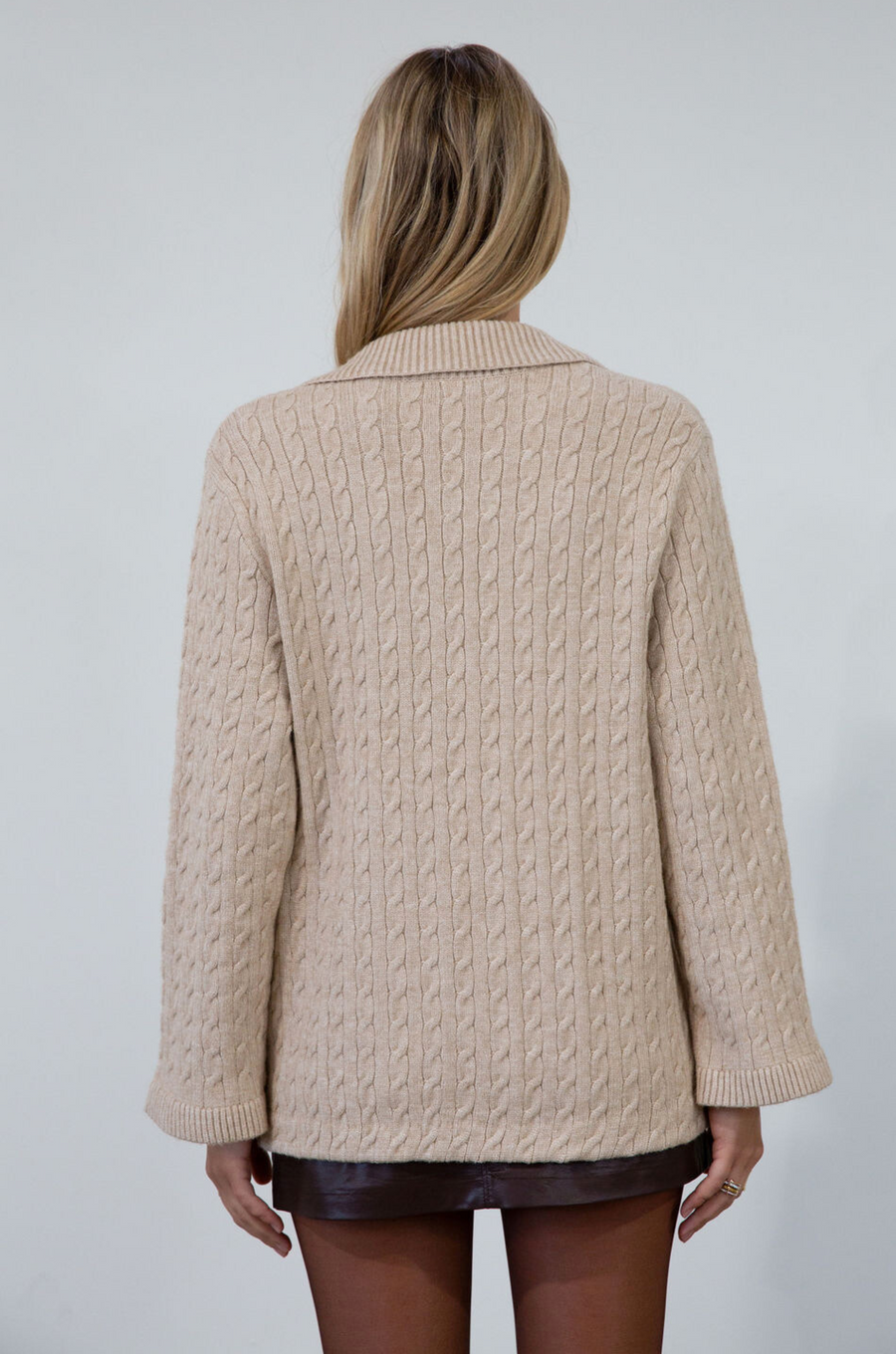 Cable knit cardigan. Double breasted. Collar neckline. Front button down closure. Front pockets. Unlined. oat cardigan sweater. fall sweater. fall outfit