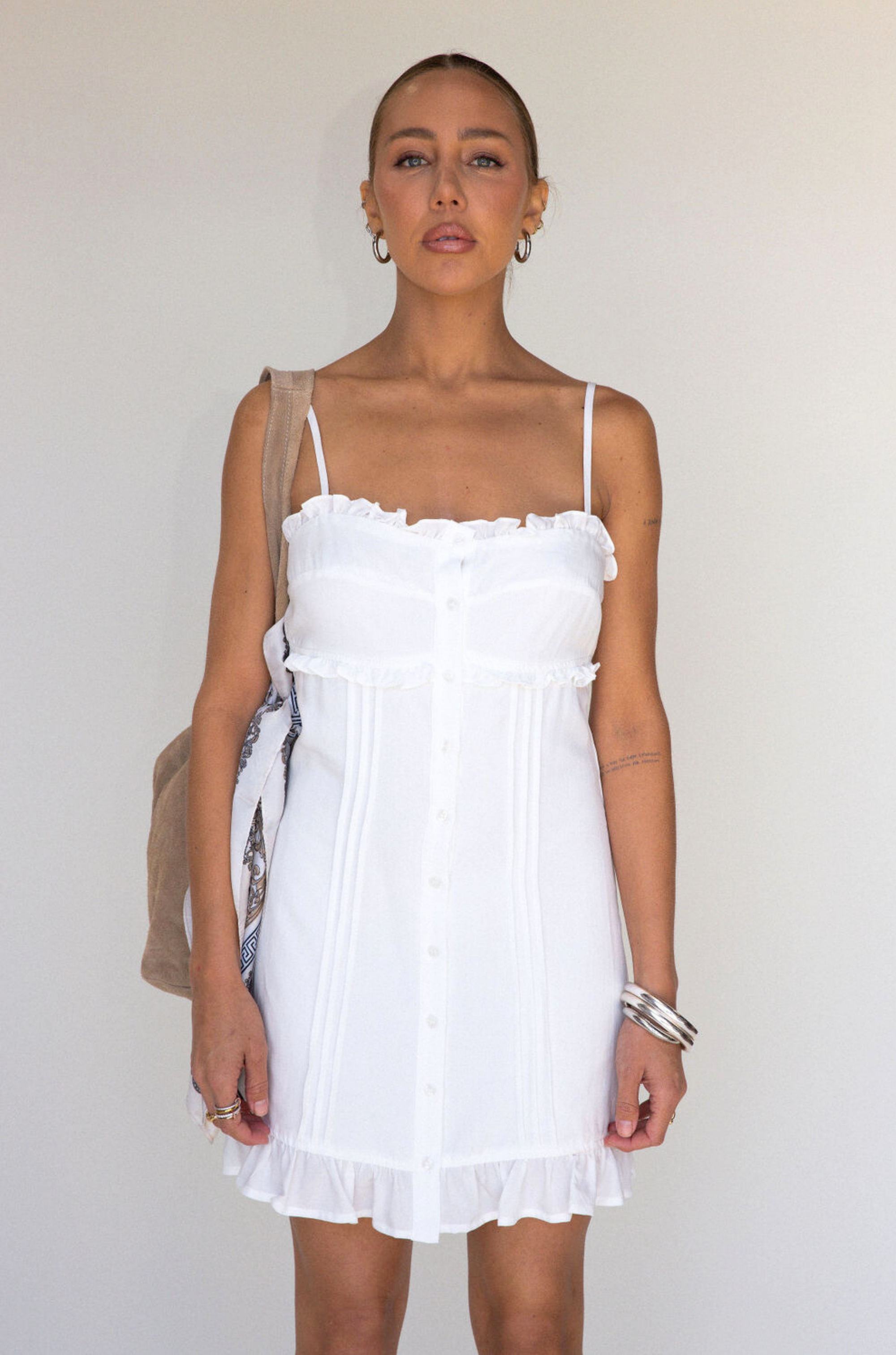 white Woven cami mini dress
Button down closure
Adjustable straps
Ruffled trim
Lined
bridal dress outfit
bachelorette 
white mini dress
summer dress
spring dress