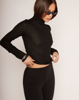 black Thin knit top
Turtleneck
Long sleeves
Unlined
black sheer long sleeve top