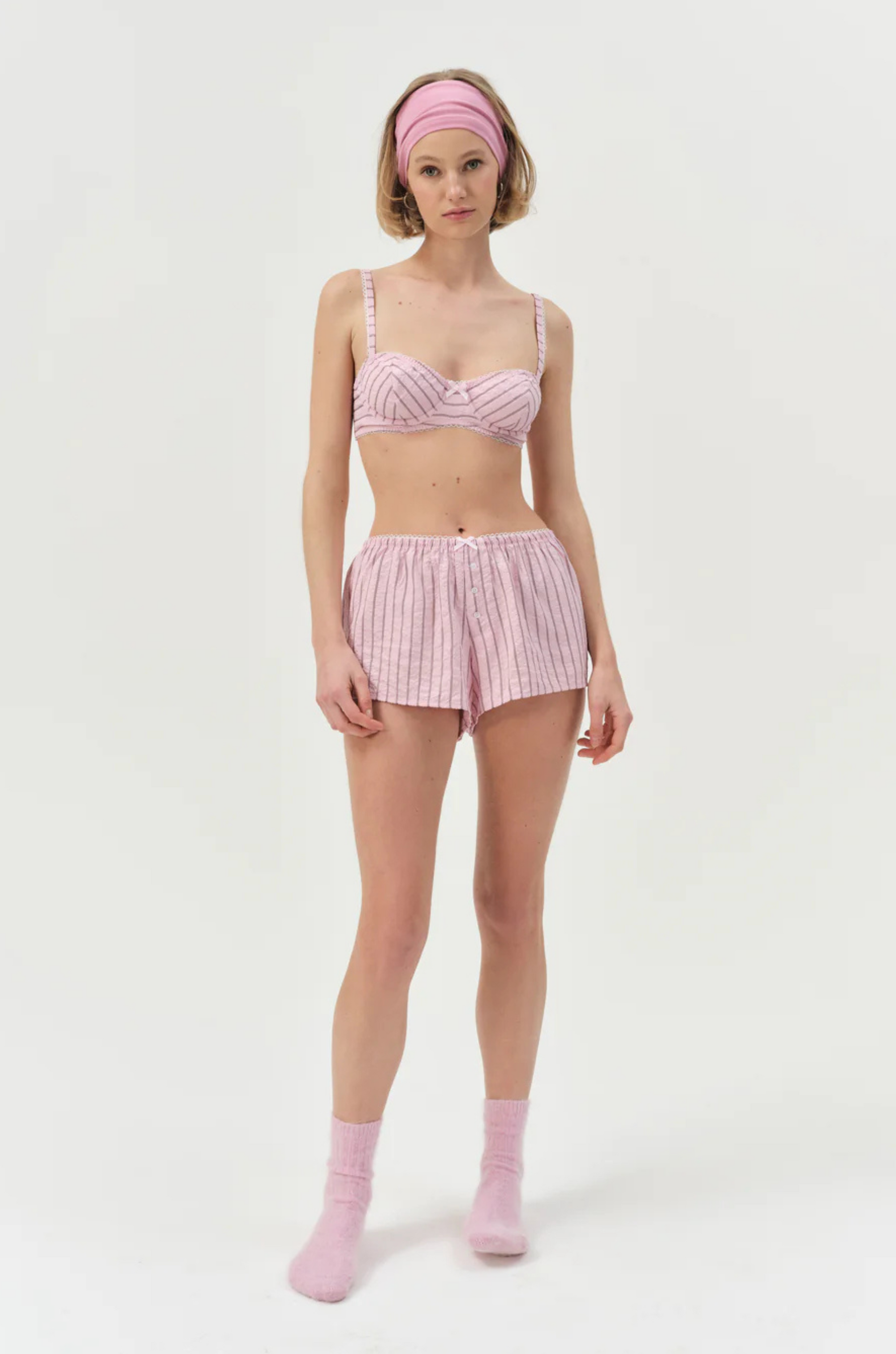 pink Striped unlined bra
Underwire cups
Adorned with picot trims
Decorative bow at front
Adjustable straps
pink bra
for love & lemons bra