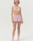pink Striped unlined bra
Underwire cups
Adorned with picot trims
Decorative bow at front
Adjustable straps
pink bra
for love & lemons bra