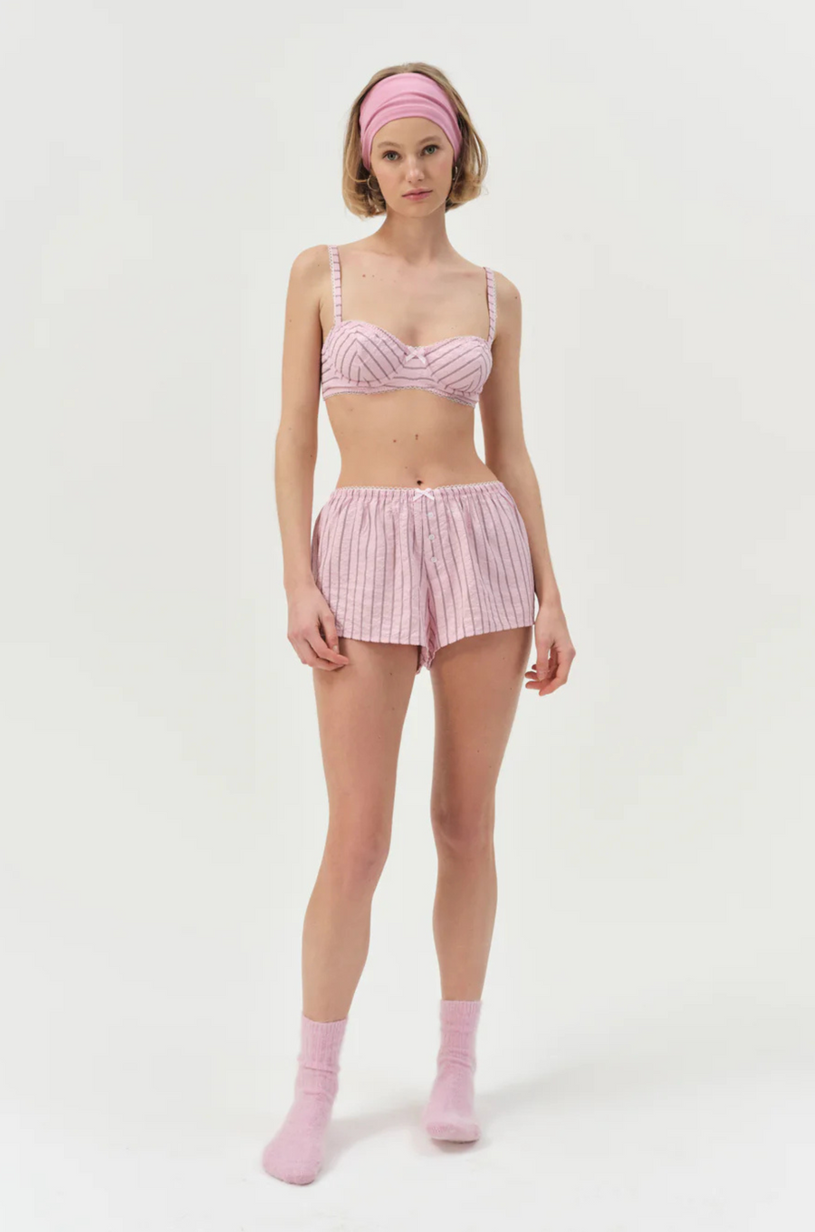 pink Striped unlined bra
Underwire cups
Adorned with picot trims
Decorative bow at front
Adjustable straps
pink bra
for love & lemons bra