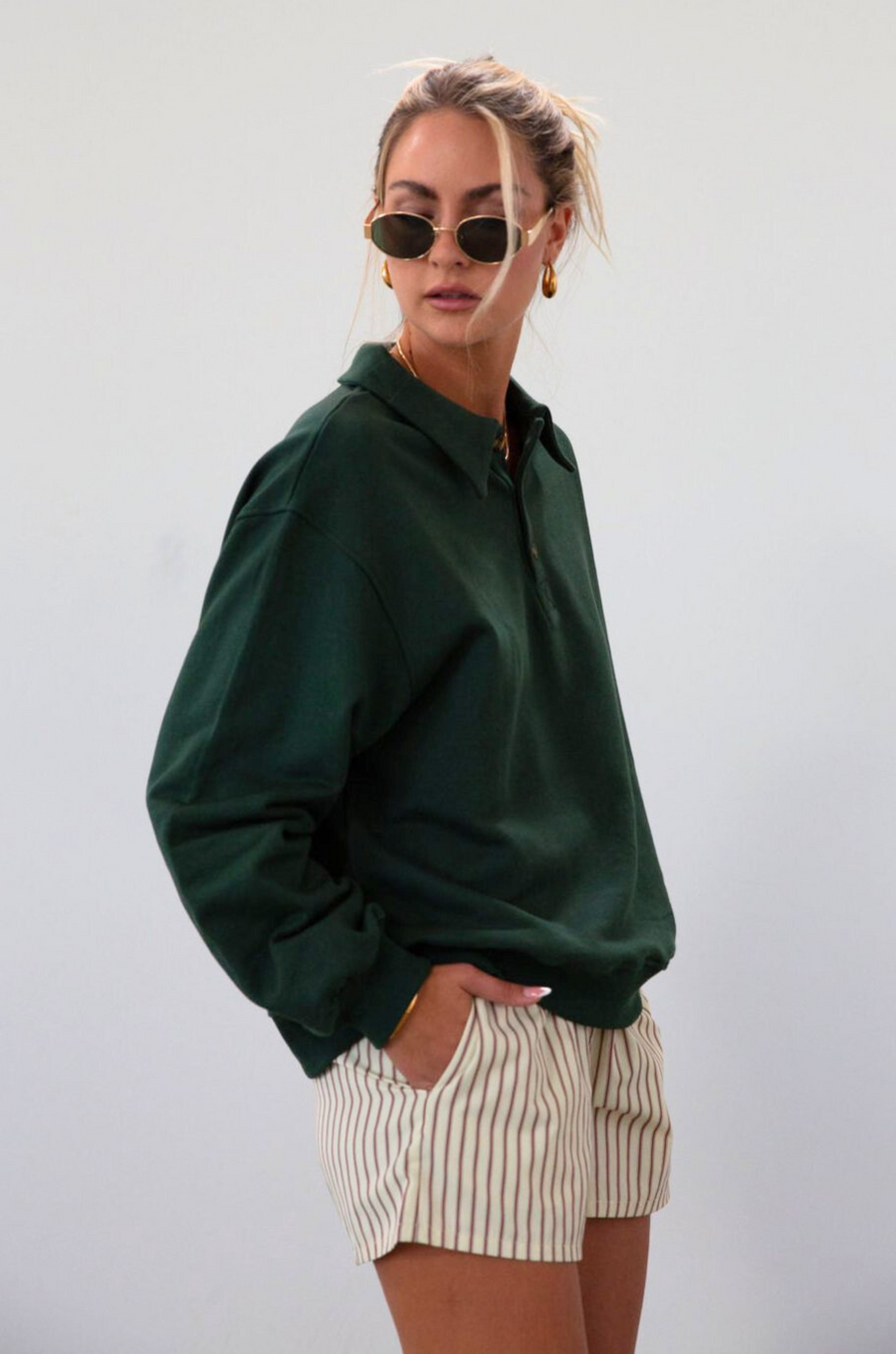Knit top. Collar neckline. Front button down closure. Unlined. green sweatshirt. fall outfit. fall top. fall transition. cute casual outfit.