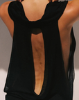 Cut from lightweight Lyocell Tissue Jersey
Deep cowl halter neckline
Reversible silhouette that can be worn front to back or back to front
Doubled skirt smooths
Adjustable length lets you wear her shorter or longer
Seamless, flattering
black mini dress with deep cowl neckline
Length: 31.5"
