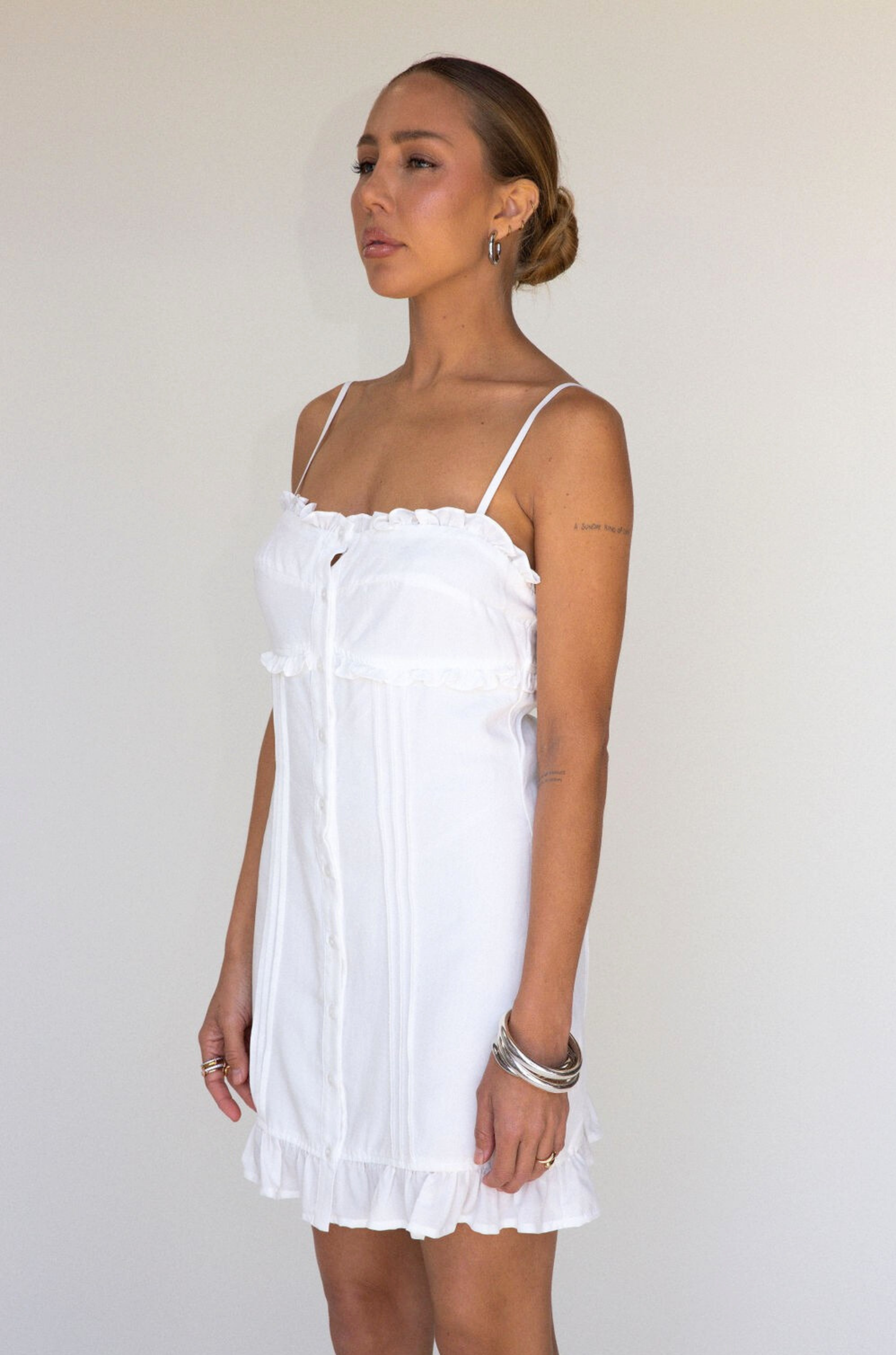 white Woven cami mini dress
Button down closure
Adjustable straps
Ruffled trim
Lined
bridal dress outfit
bachelorette 
white mini dress
summer dress
spring dress