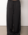black Satin pull on pants
Adjustable drawstring waistband
Elastic waistband
Side pockets
Unlined
Length: 40"
Polyester
fall pants
fall bottoms
fall outfit