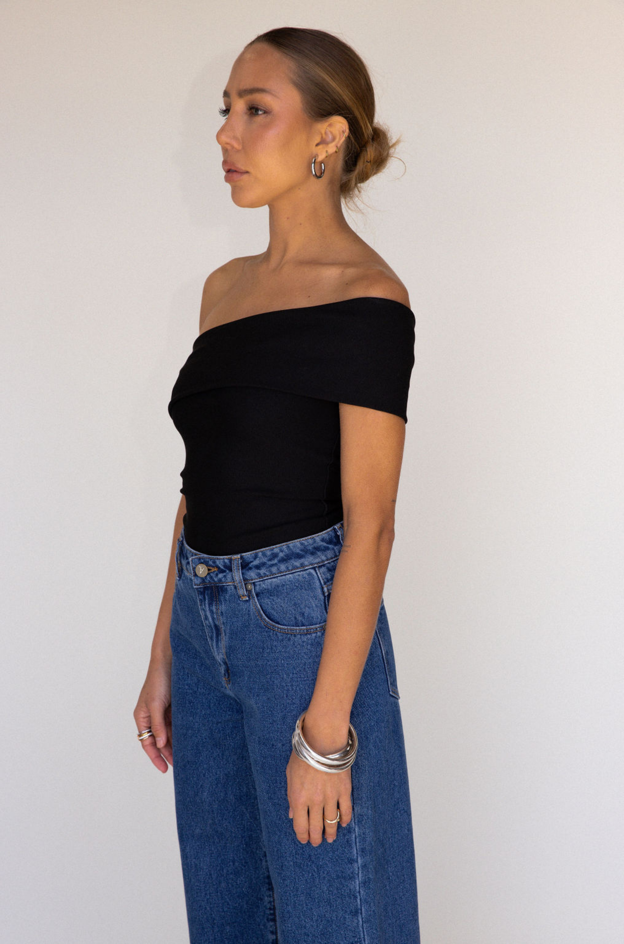 black Ribbed bodysuit
One shoulder neckline
Snap bottom closures
Thong back
Unlined
going out top