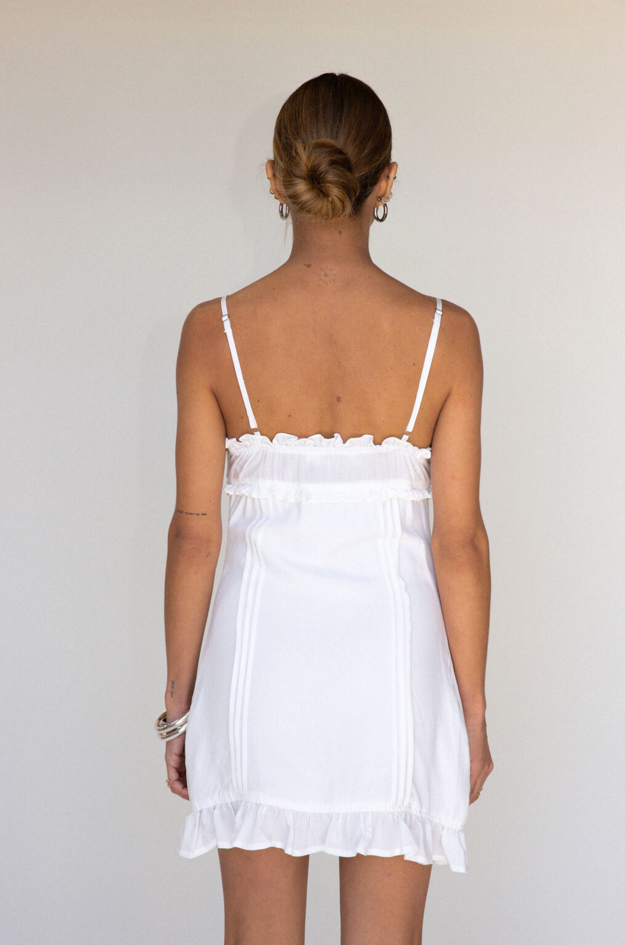 white Woven cami mini dress
Button down closure
Adjustable straps
Ruffled trim
Lined
bridal dress outfit
bachelorette 
white mini dress
summer dress
spring dress