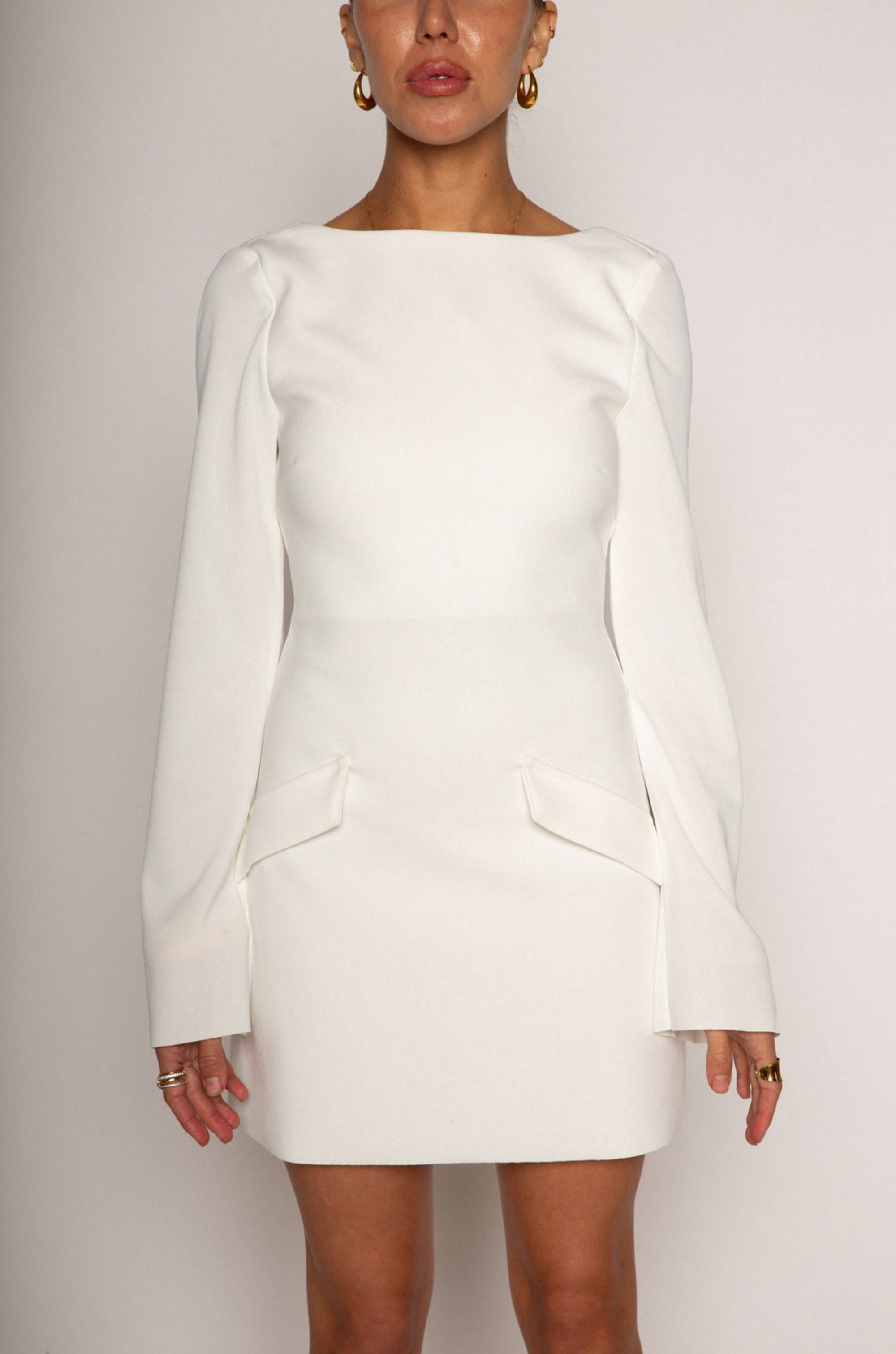 Stretch woven long sleeve dress
white mini long sleeve dress
Boatneck
Faux front pockets
Open back
Back hook and eye and zipper closures
Partially lined
Raw edge hem
bridal shower dress
night before dress
bridal dress