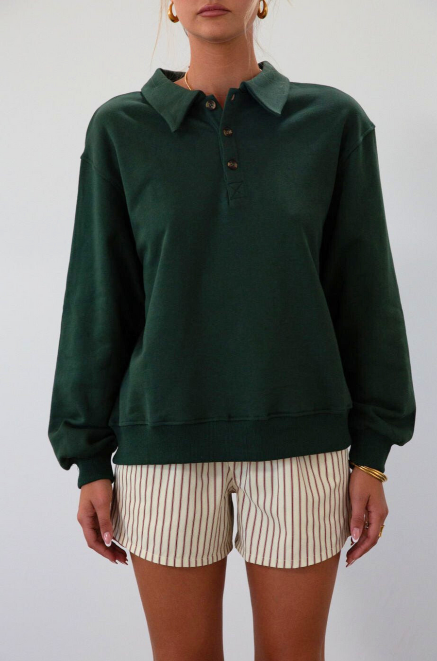 Knit top. Collar neckline. Front button down closure. Unlined. green sweatshirt. fall outfit. fall top. fall transition. cute casual outfit.