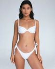 white Eyelet embroidered underwire bikini top
Adjustable back tie
Runs small
Soft & delicate fabric, wear with care
Cotton