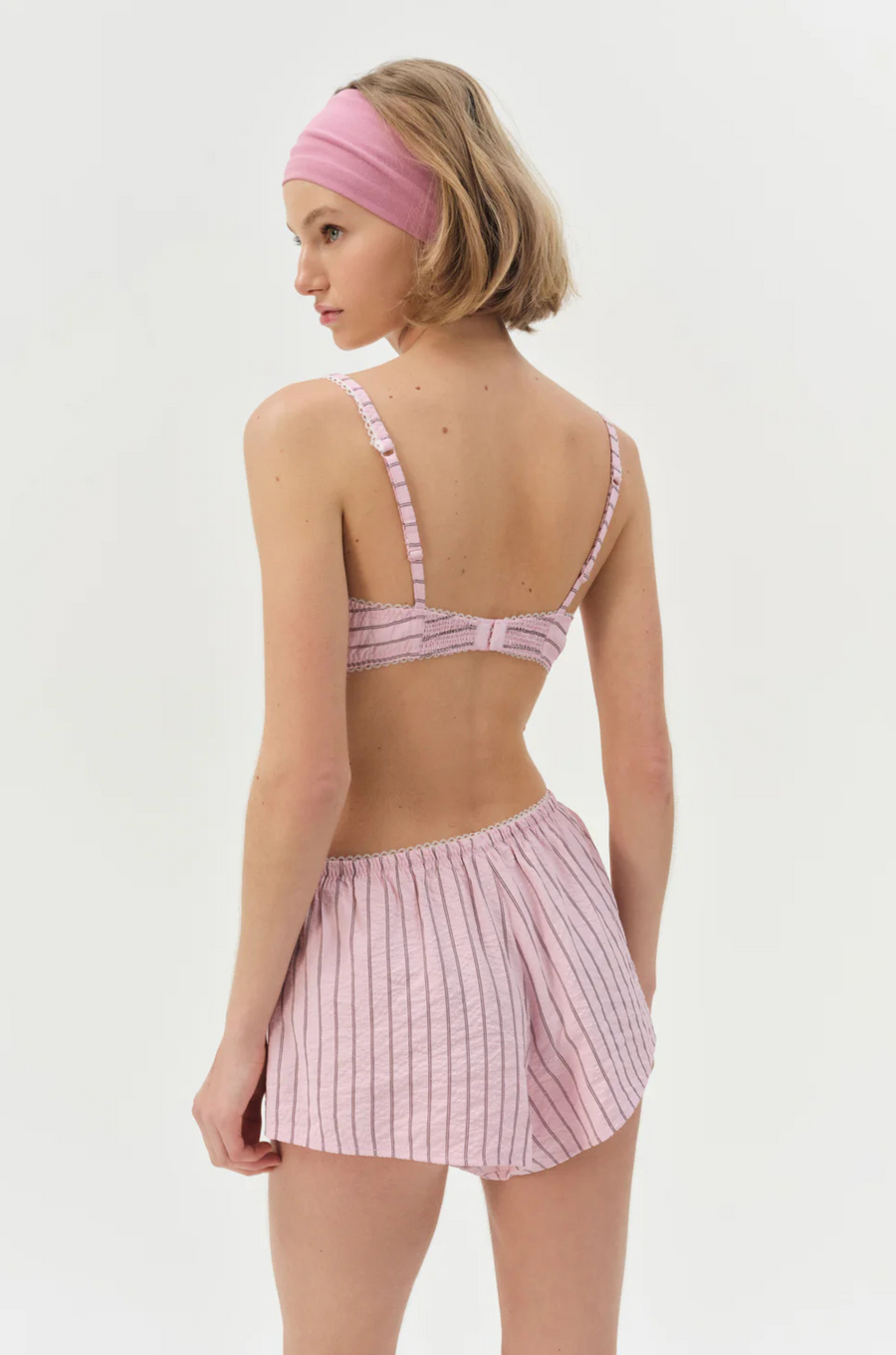 pink Striped unlined bra
Underwire cups
Adorned with picot trims
Decorative bow at front
Adjustable straps
pink bra
for love & lemons bra