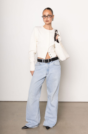 ivory Knit cardigan
Long sleeves
Front button down closure
Banded hems
Unlined
holiday cardigan sweater