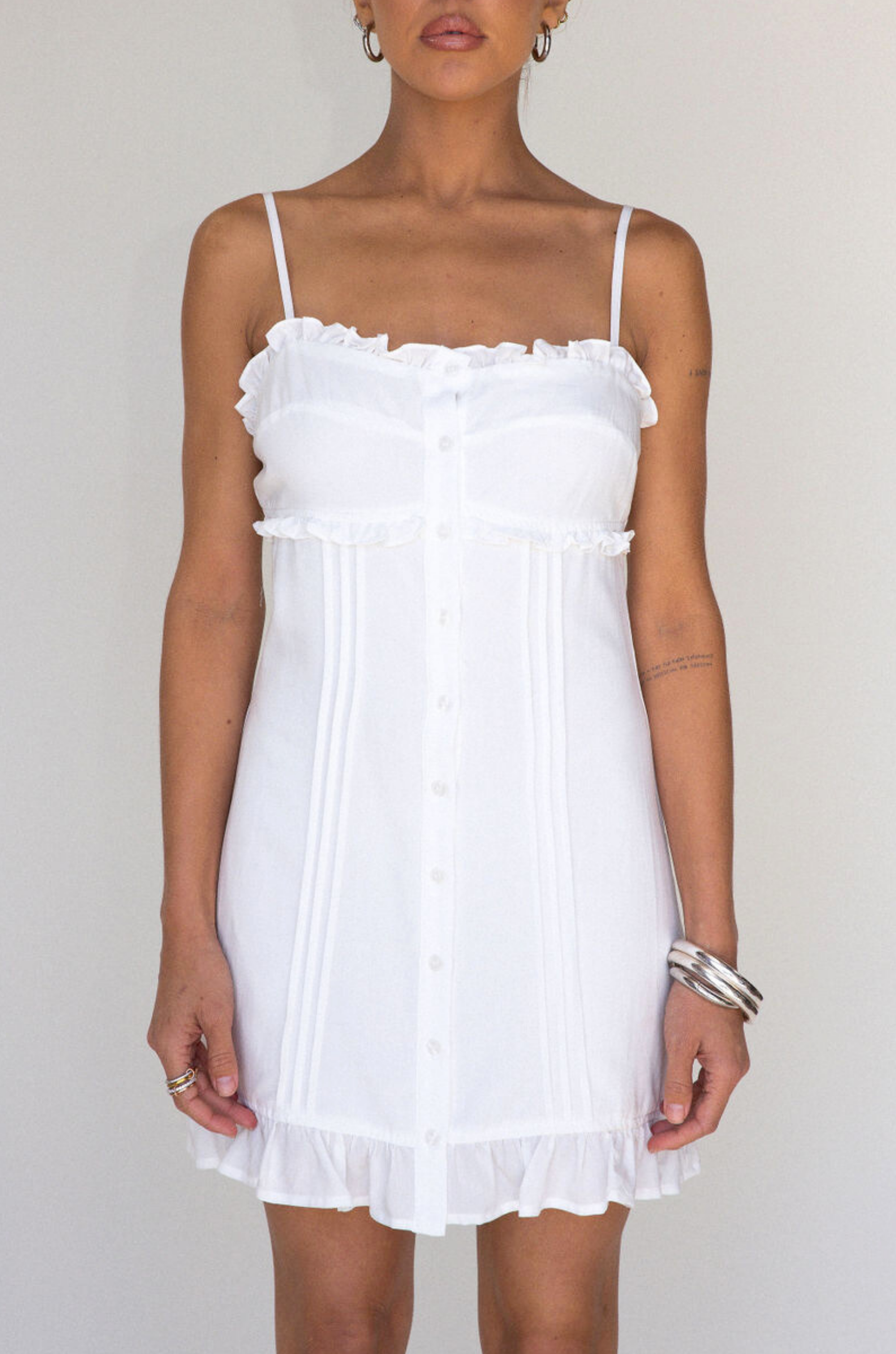 white Woven cami mini dress
Button down closure
Adjustable straps
Ruffled trim
Lined
bridal dress outfit
bachelorette 
white mini dress
summer dress
spring dress