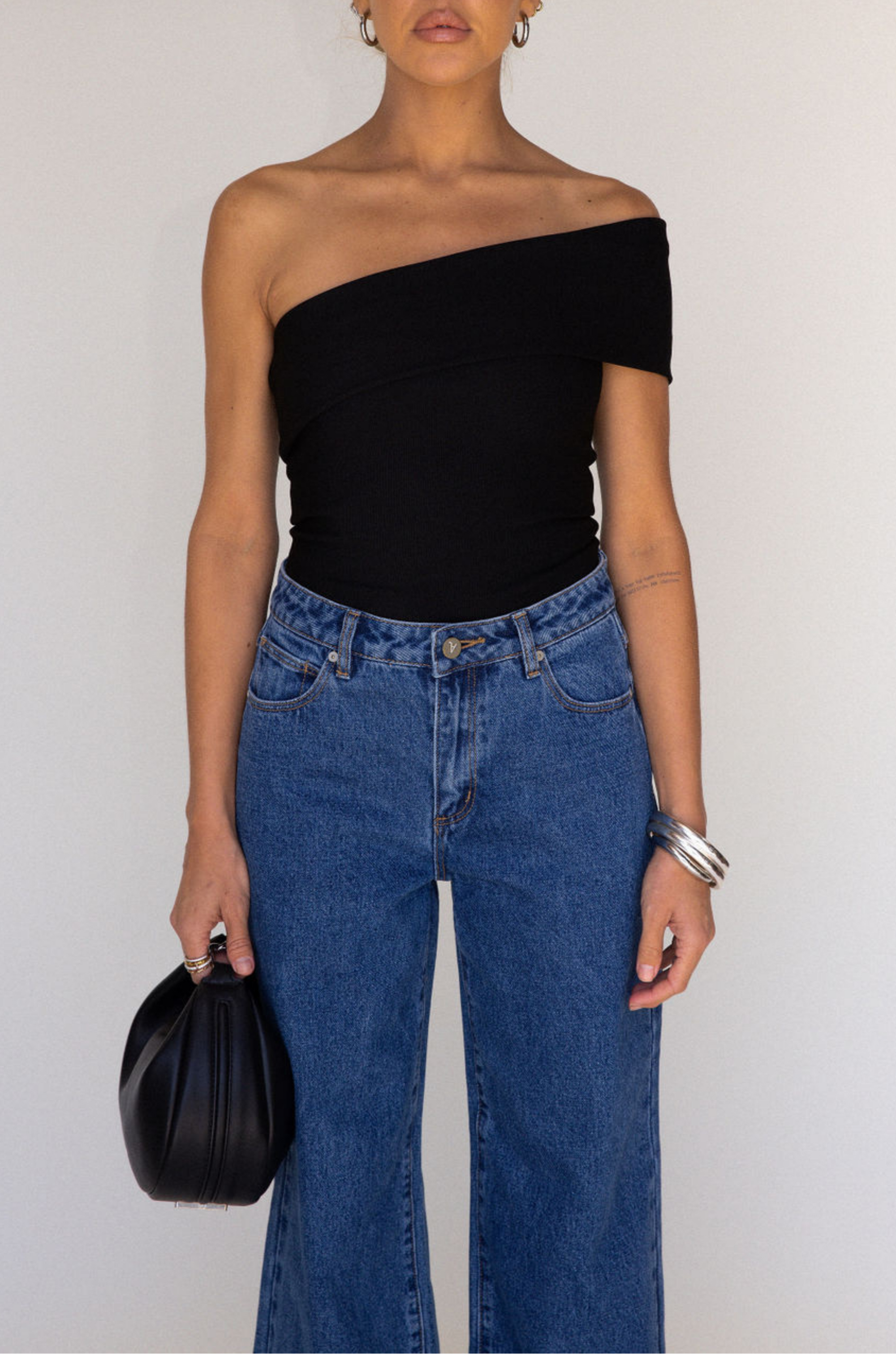 black Ribbed bodysuit
One shoulder neckline
Snap bottom closures
Thong back
Unlined
going out top