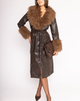 brown Midi-length faux leather coat
Straight silhouette with a wrap front
Belt to cinch the waist
Shearling trims the oversized collar and wide cuffs
Button down closure
Lined
leather coat with fur trim
Aspen vibes