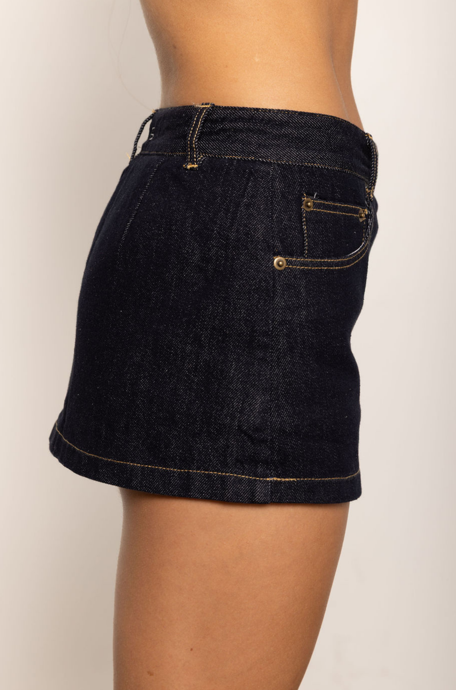 Denim mini skirt
Mid rise
Dark wash
Inner shorts lining
3 pocket construction
Side zipper closure
Belt loops
dark denim mini skirt 
dark denim mini skort
fall outfit
thanksgiving outfit