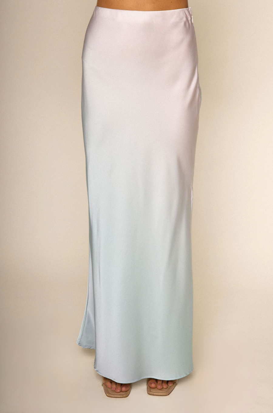 Blush ombre maxi skirt
Side slit
Elastic waistband
Side zipper closure
Unlined
pink and blue ombre maxi skirt