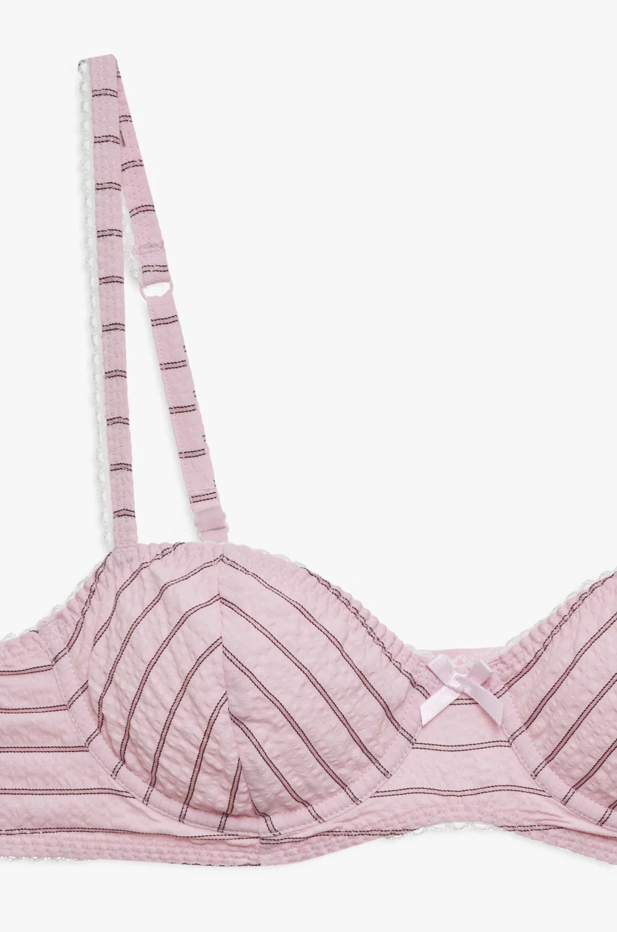 pink Striped unlined bra
Underwire cups
Adorned with picot trims
Decorative bow at front
Adjustable straps
pink bra
for love & lemons bra