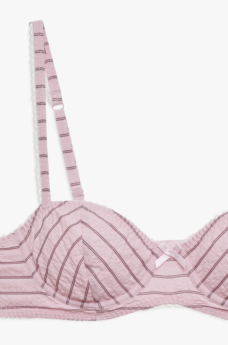 pink Striped unlined bra
Underwire cups
Adorned with picot trims
Decorative bow at front
Adjustable straps
pink bra
for love & lemons bra