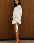 white Crinkle chiffon mini dress
Padded shoulders
Front tie
Ruffle trim
Lined
bridal mini dress
resort vacation dress
