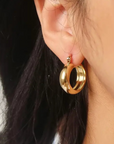 18K Non-Tarnish Classic Elongated Hoop Earring
18K Gold Plating
Stainless Steel