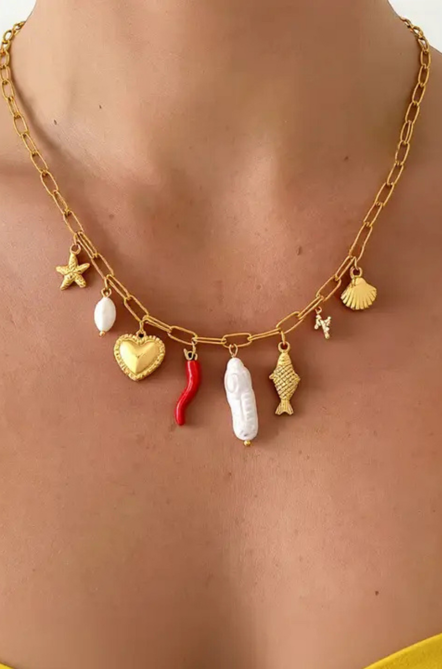 18K Gold Non-Tarnish Pepper Fish Pearl Charm Necklace
18K Gold Plating Stainless Steel
Pendant Size: 0.5 - 1.1 inches&nbsp;
Chain Length: 17.7"
Extension Length: 2"
Lead and Nickel Free
Hypoallergenic
Water Resistant
