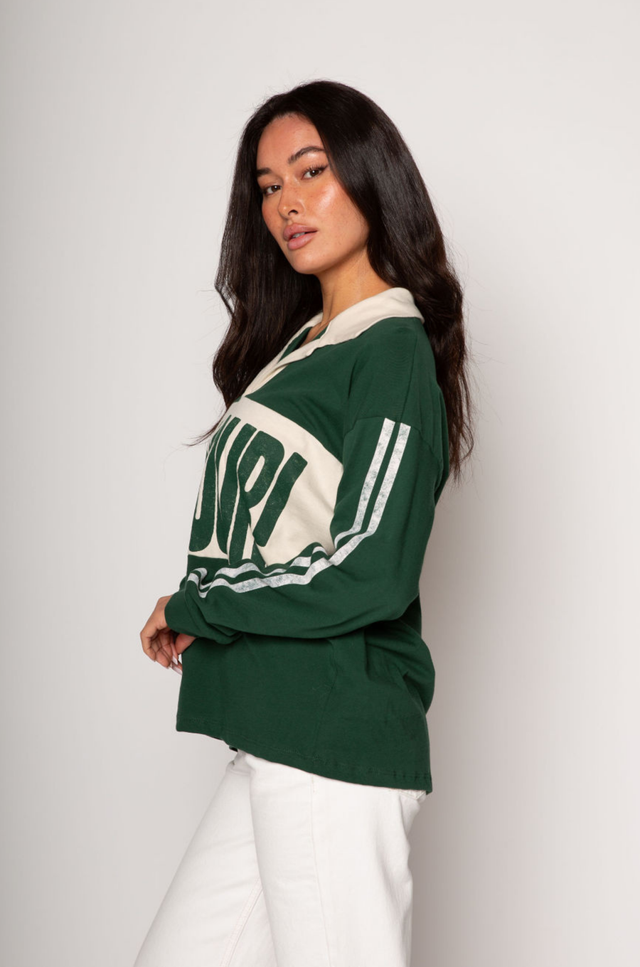 Graphic printed knit top. Collar neckline. Long sleeves. Unlined. green graphic long sleeve tee. bonjour tee