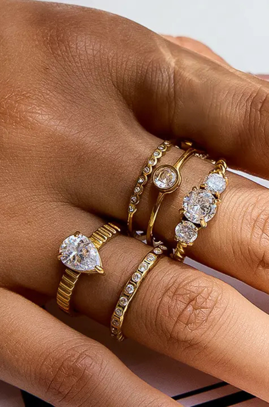 18K Gold Non-Tarnish Thin CZ Ring
18K Gold Plating
Stainless Steel
Cubic Zirconia
Size 7 Measurement: 0.682 Diameter/2.14 Circumference
Size 8 Measurement: 0.714 Diameter/2.24 Circumference
Lead-free/Nickel-safe/Hypoallergenic/Water Resistant
gold cz band ring