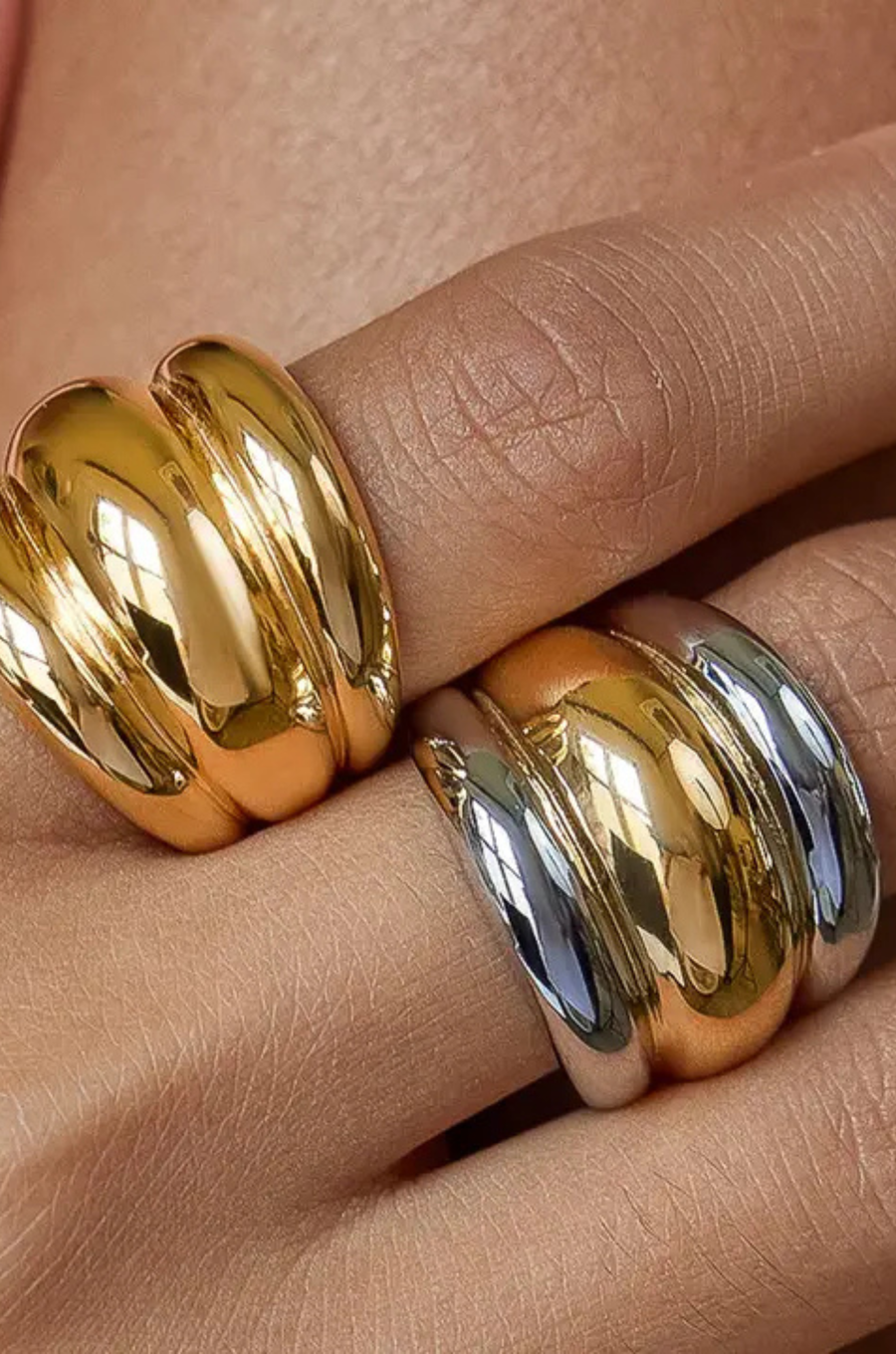 18K Gold Non-Tarnish Two Toned Dome Statement Ring&nbsp;
18K Gold Plating
Stainless Steel
Size 7 Measurement: 0.682 Diameter/2.14 Circumference
Lead-free
Nickel-safe
Hypoallergenic
Water Resistant
two toned dome ring