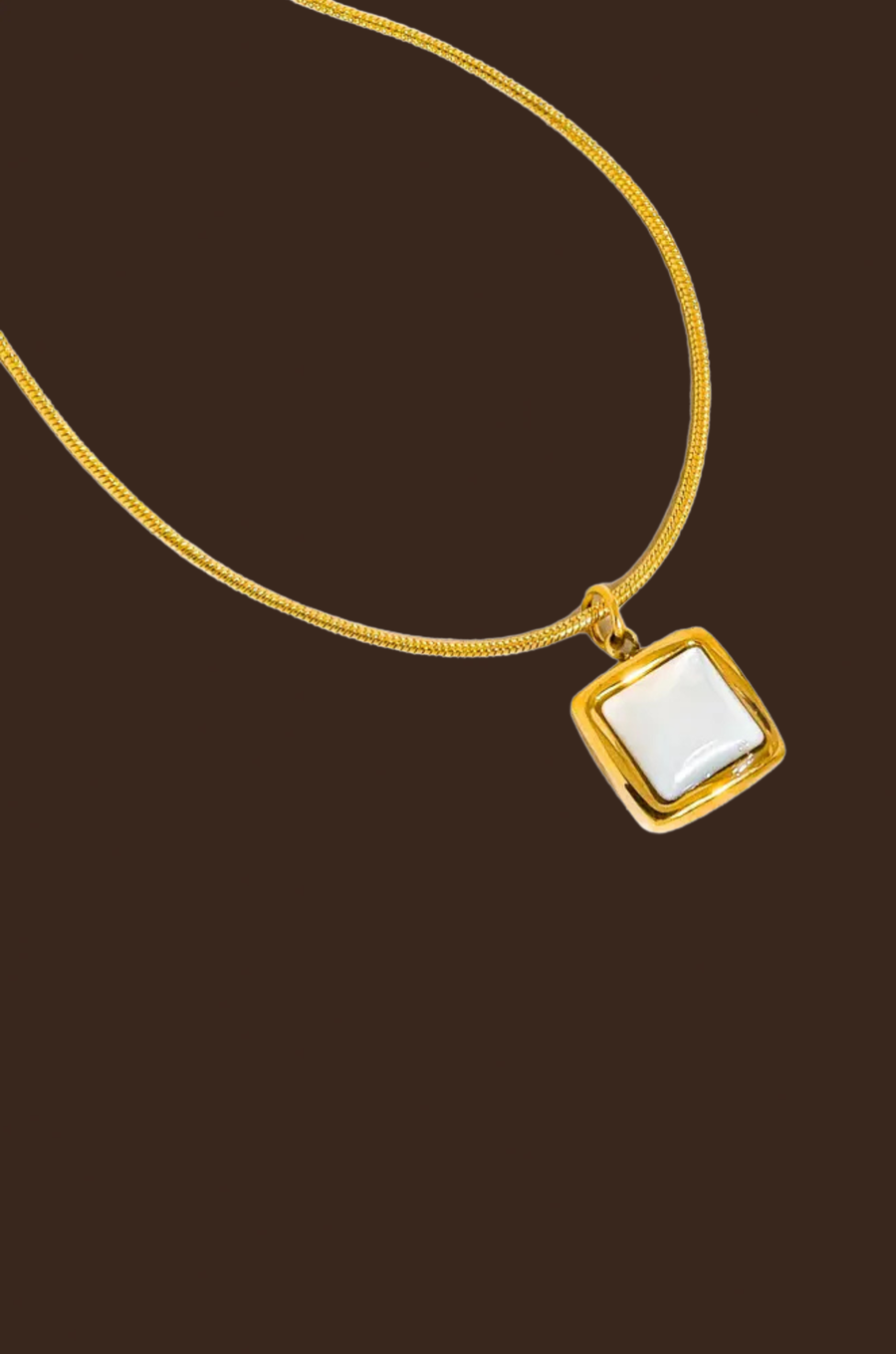 18K gold non-tarnish square shell necklace
18k gold plating stainless steel
Pendant Size: 0.4 x 0.4
Chain Length: 15.5"
Extension Length: 2"
Lead and Nickel Free
Hypoallergenic
Water Resistant