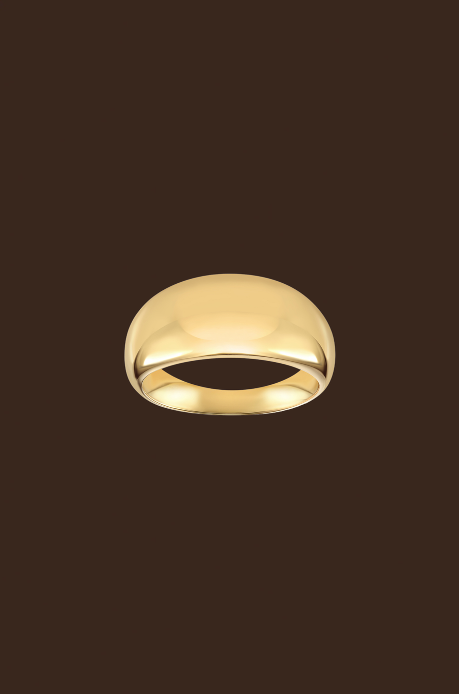 Gold ring on a dark brown background
