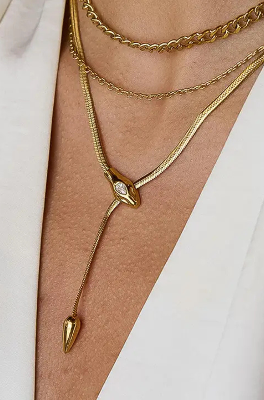 18K Gold Non-Tarnish Serpent Y Lariat Necklace
18K Gold Plating
Stainless Steel
Pendant Size: 2.36"
Chain Length: 15.74"
Extension: 2"
Lead-free/Nickel-safe/Hypoallergenic/Water Resistant