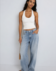 Mid-rise, loose fit with a full-length baggy leg profile
Rolla's signature back pocket stitching vintage logo button
Button fly zip closure
light to medium wash denim jeans
rollas jeans