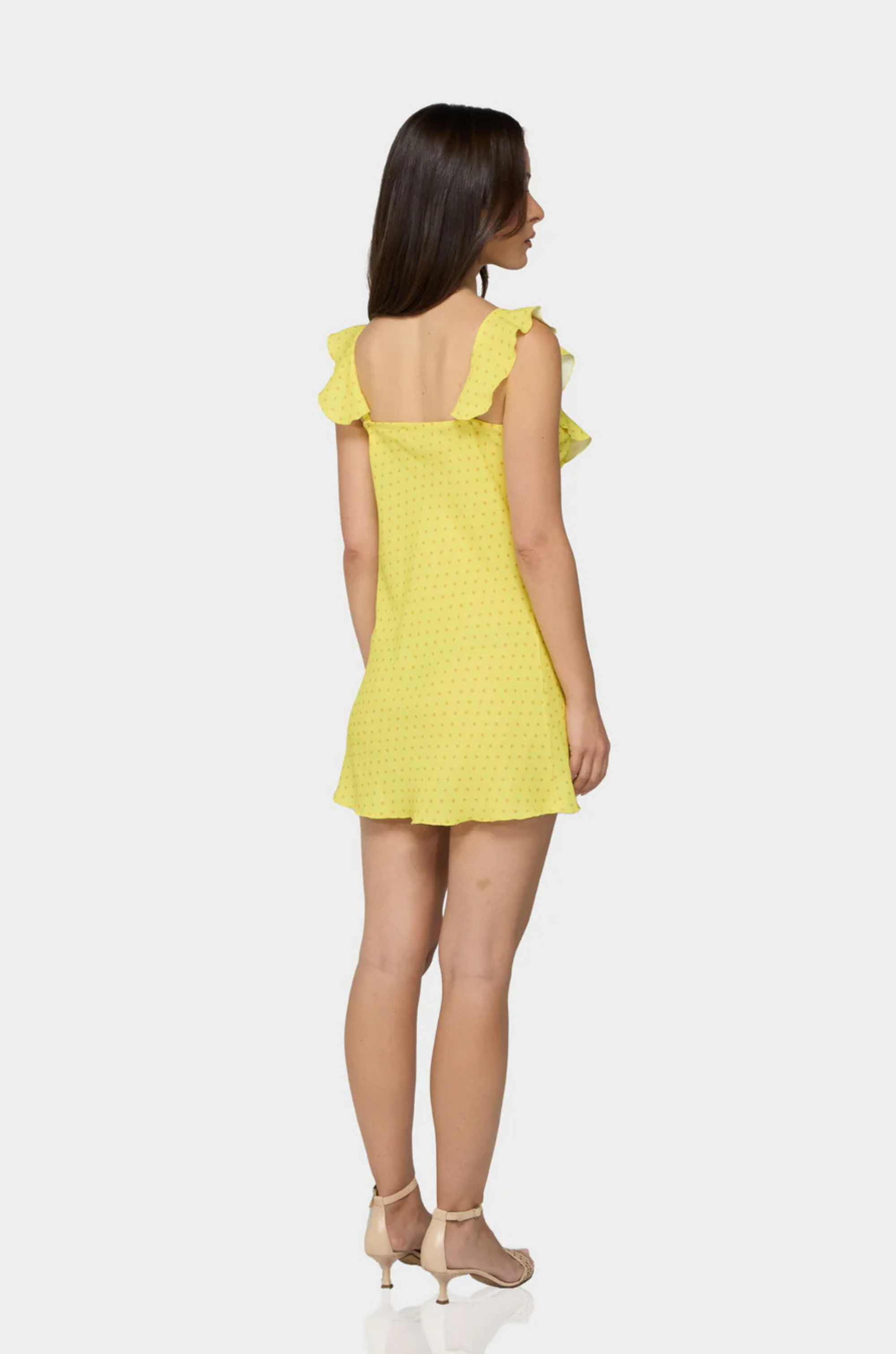 yellow Polka dot mini dress
Adjustable straps
Ruffled neckline trim
Unlined