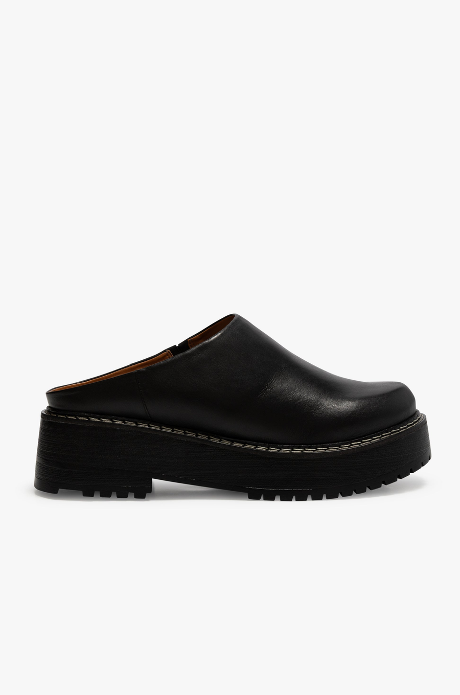 Chunky platform mule slide
Contrast stitching
Leather upper, manmade outsole
Synthetic leather lining
2.5" heel, 1" platform
Imported
black chunky platform slide mule
dr martins dupe