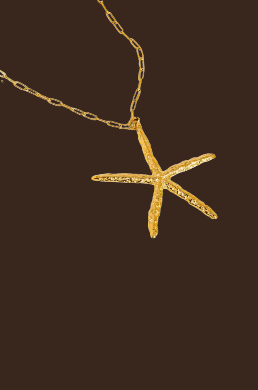 18K Gold Non-Tarnish Statement Starfish Necklace
18K Gold Plated
Stainless Steel
Pendant Size: 1.39" / Chain Length: 30.3" / Extension Length: 2"
Lead-free
Nickel-safe
Hypoallergenic
Water Resistant
Gold starfish necklace