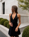 black Halter neck mini dress
V neckline
Adjustable neck tie
A line
Back zipper closure
Lined