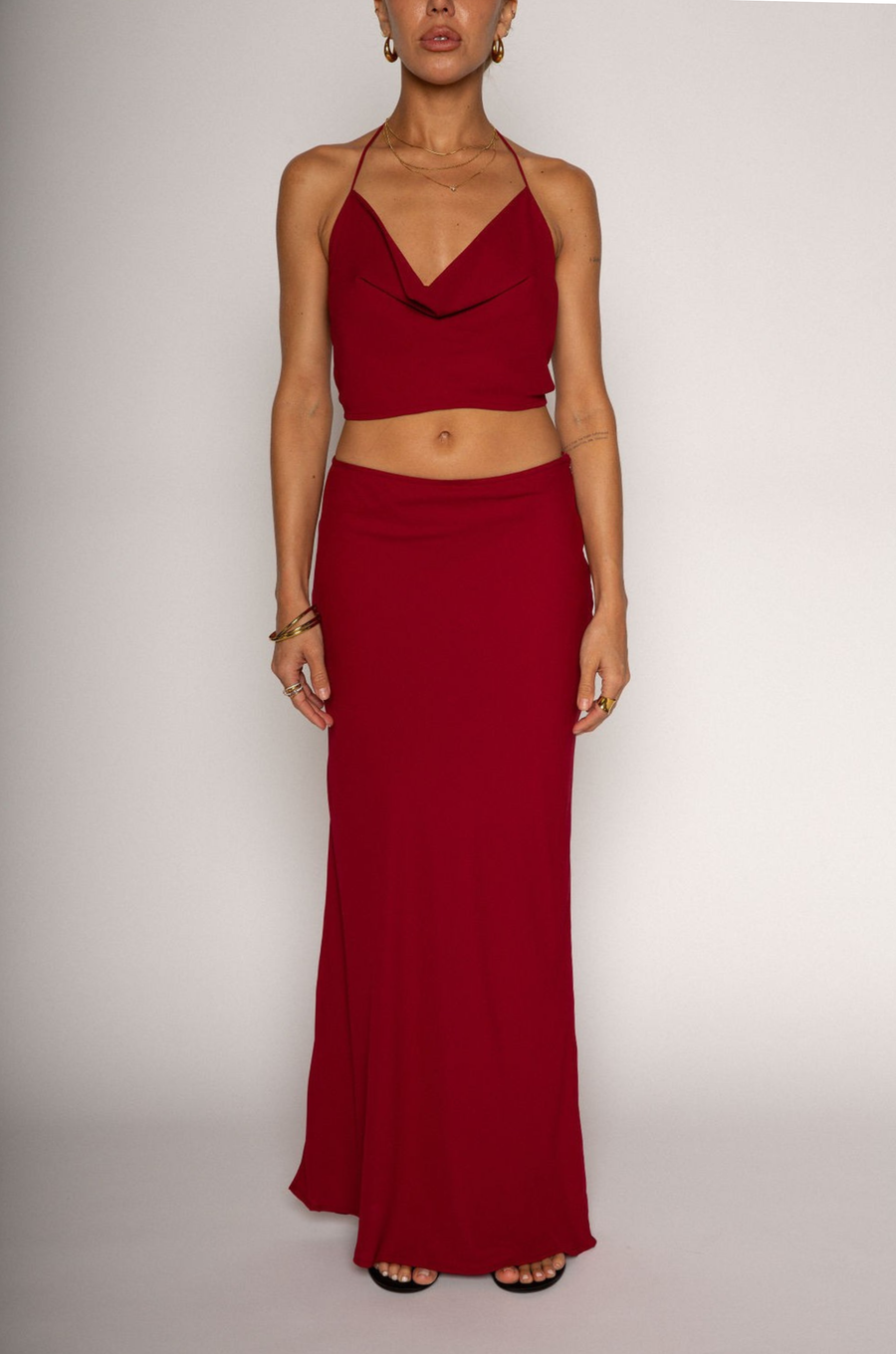 Halter crop top. Adjustable neck and back tie strap. Cowl neck. Partially lined. Maxi skirt. Hidden side zipper. Lined. red skirt set. cherry red skirt set. going out set. nice dinner set. summer outfit. spring outfit.