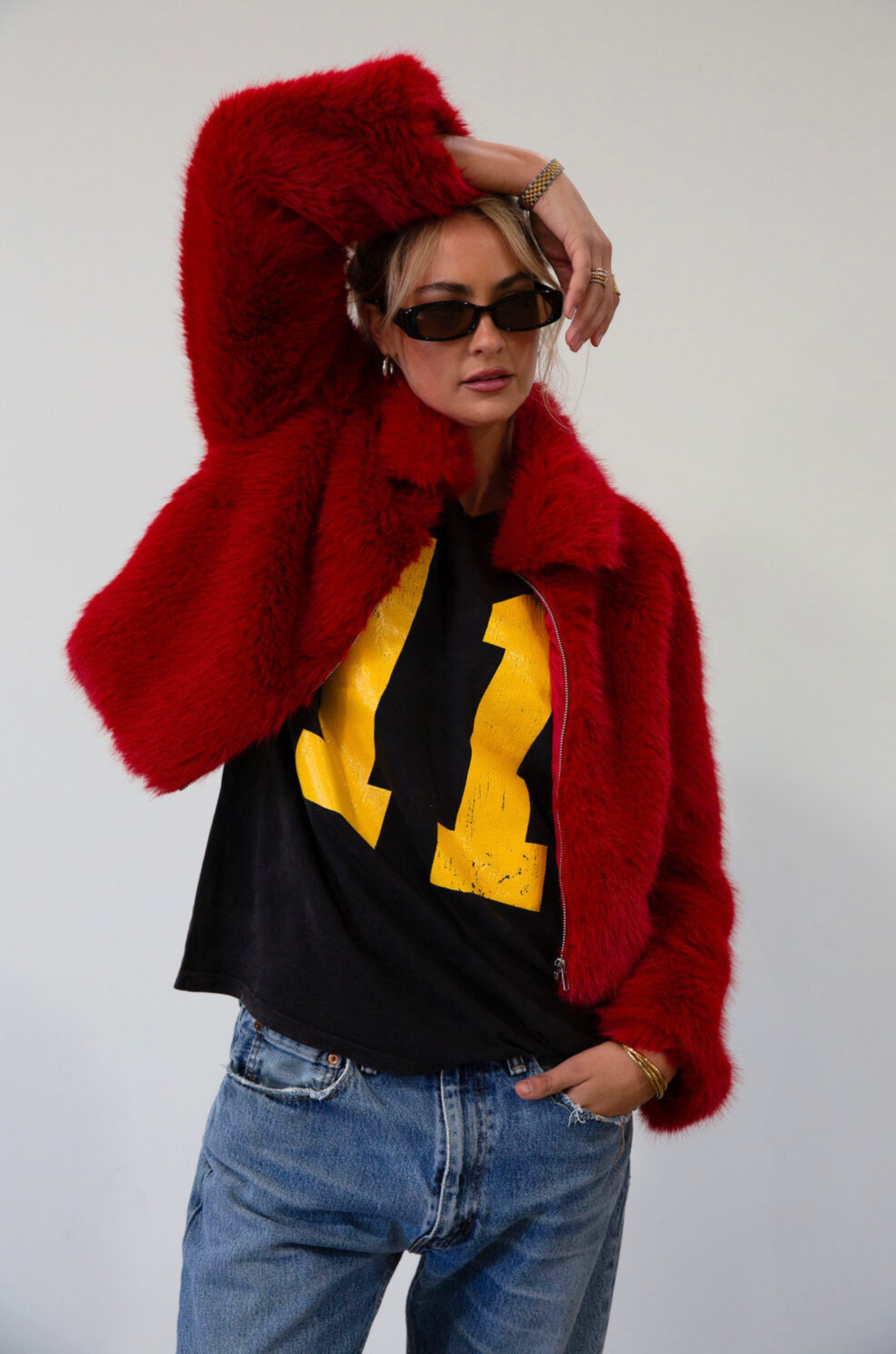 Faux fur coat. Collar neckline. Front zipper closure. Side pockets. Fully lined. red fur coat. fall coat. winter coat. red faux fur coat