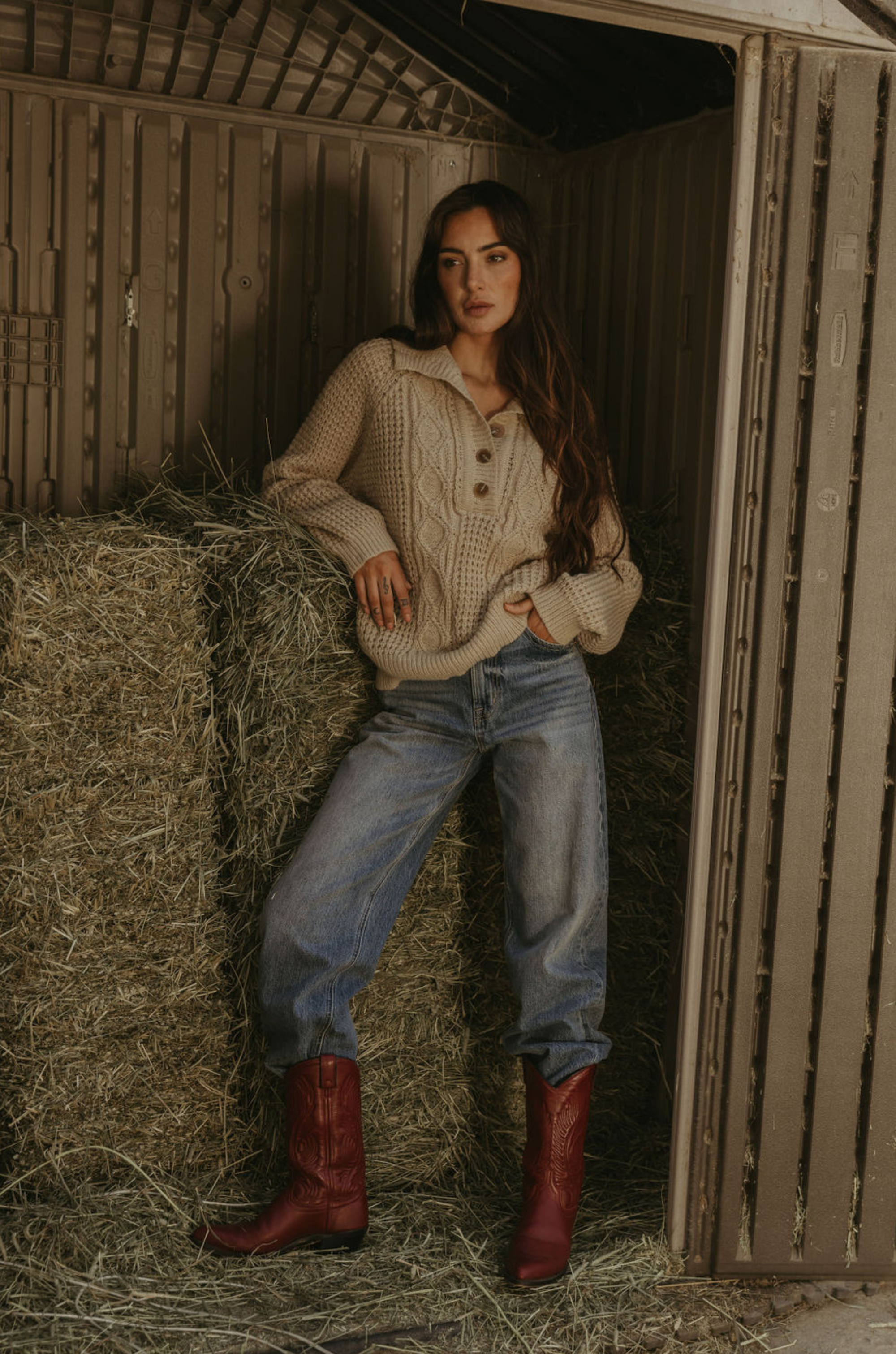 Fuzzy mixed knit crochet sweater. Collar neckline. Front button closures. Long sleeves. Banded hems. Unlined. tan sweater. knit sweater. quarter button up sweater