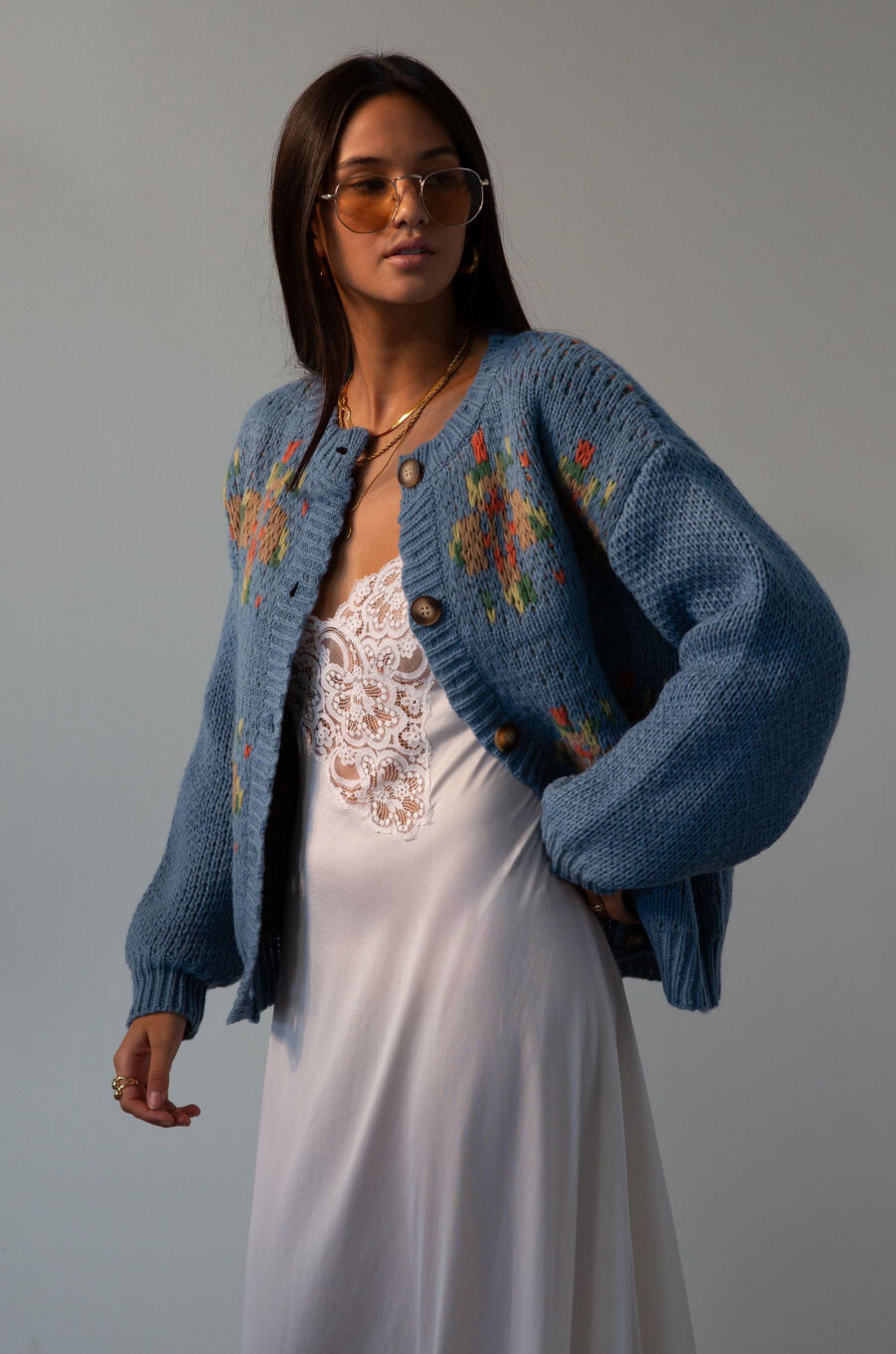 Crochet knit cardigan. Front button down closure. blue sweater cardigan. fall outfit. blue cardigan. blue sweater cardigan. grandma looking sweater