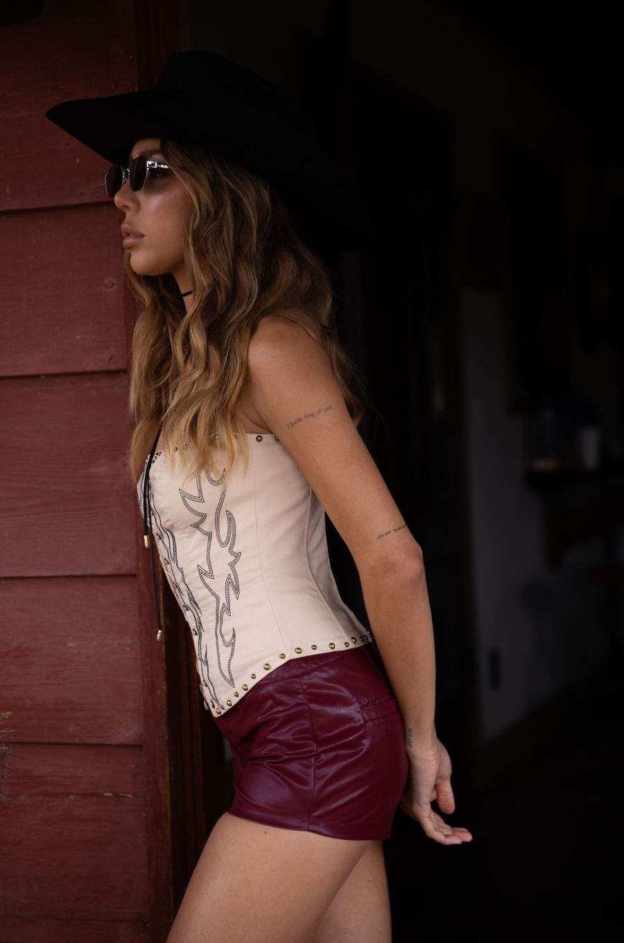 Embroidered knit corset
Adjustable halter tie neck
Front lace up closure
Back hook and eye and zipper closures
Fully lined
Studded details
Coachella outfit
Stagecoach outfit
Festival Outfit
