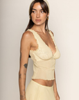 yellow and brown Mesh polka dot tank top with head scarf
V-neck neckline
Ruffle trim
Unlined/sheer