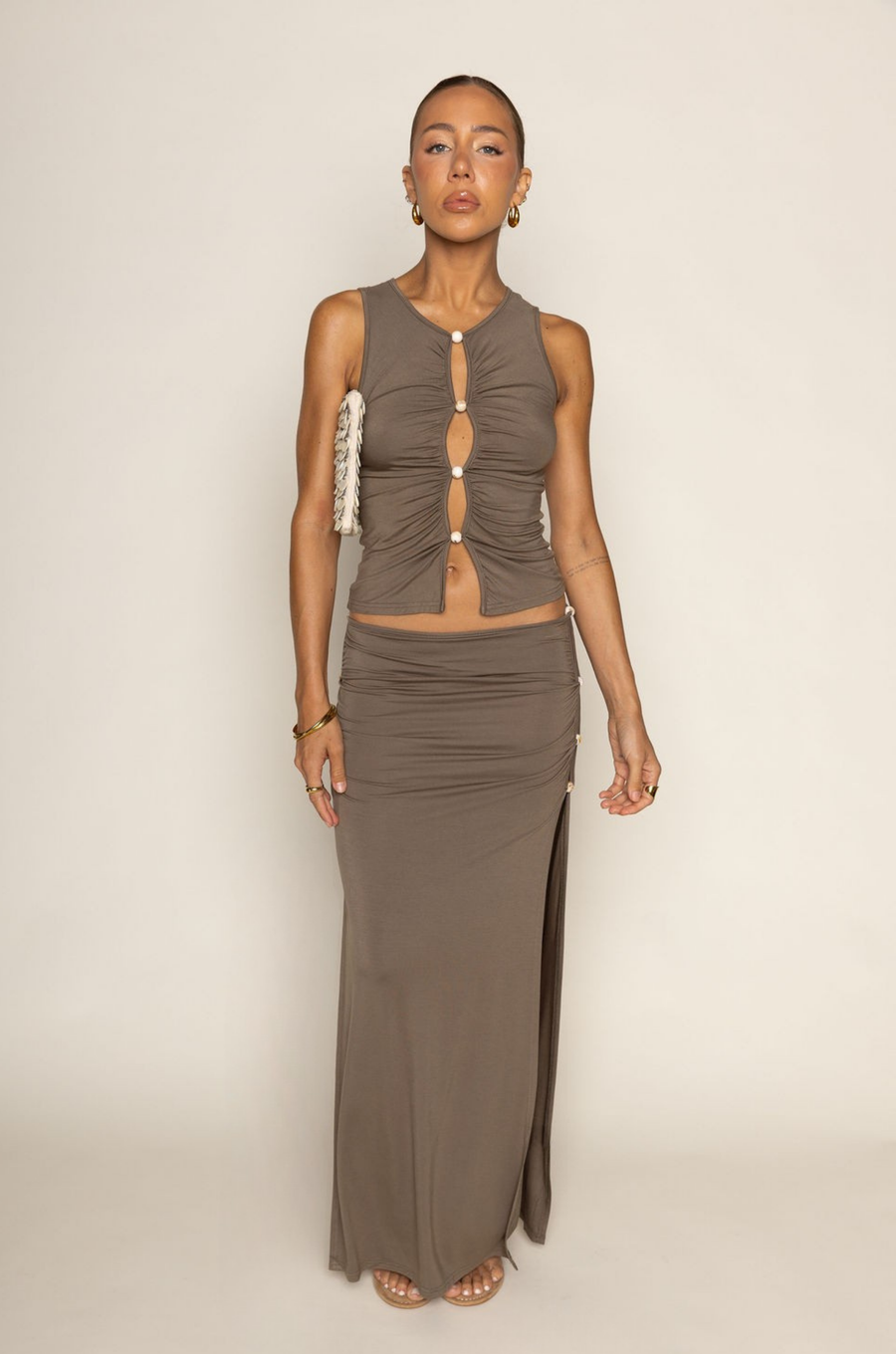 TOP:
green Shirred tank top
Front cut outs with stone beads
Unlined

BOTTOM:
green Shirred maxi skirt
Side cut out with stone beads
Unlined
side slits